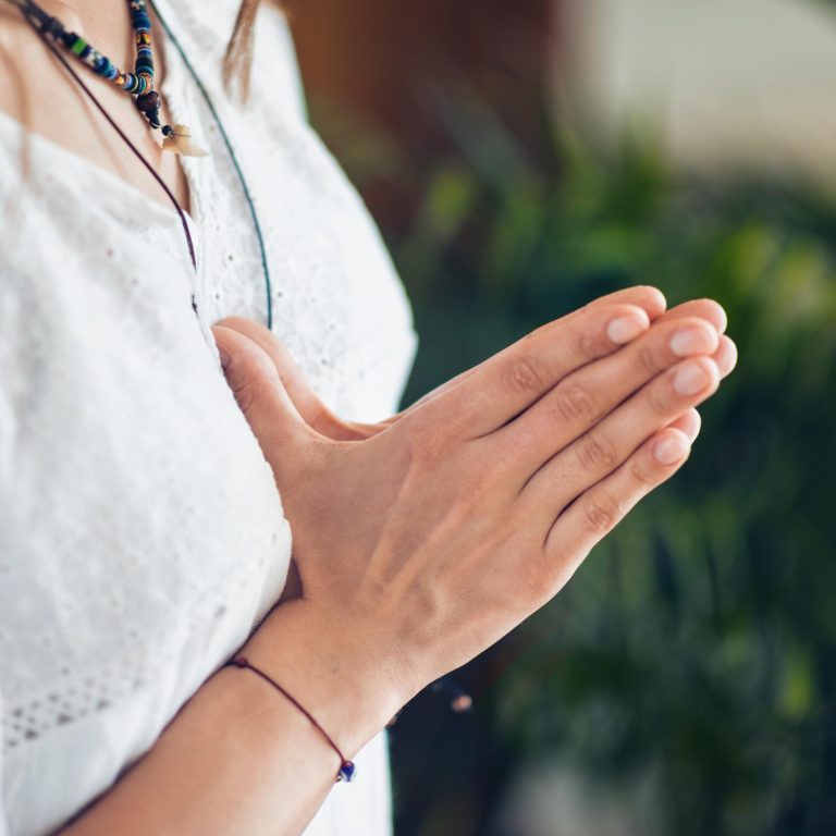 The Reiki practitioner for Windsor residents prepares for a session