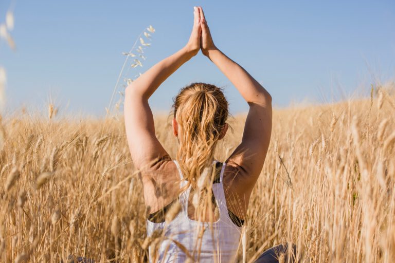 A person meditating in nature - meditation near Windsor