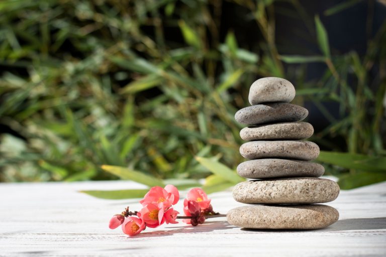 Stones stacked on top of each other - a symbol of balance and composure provided by a reiki session near Maidenhead